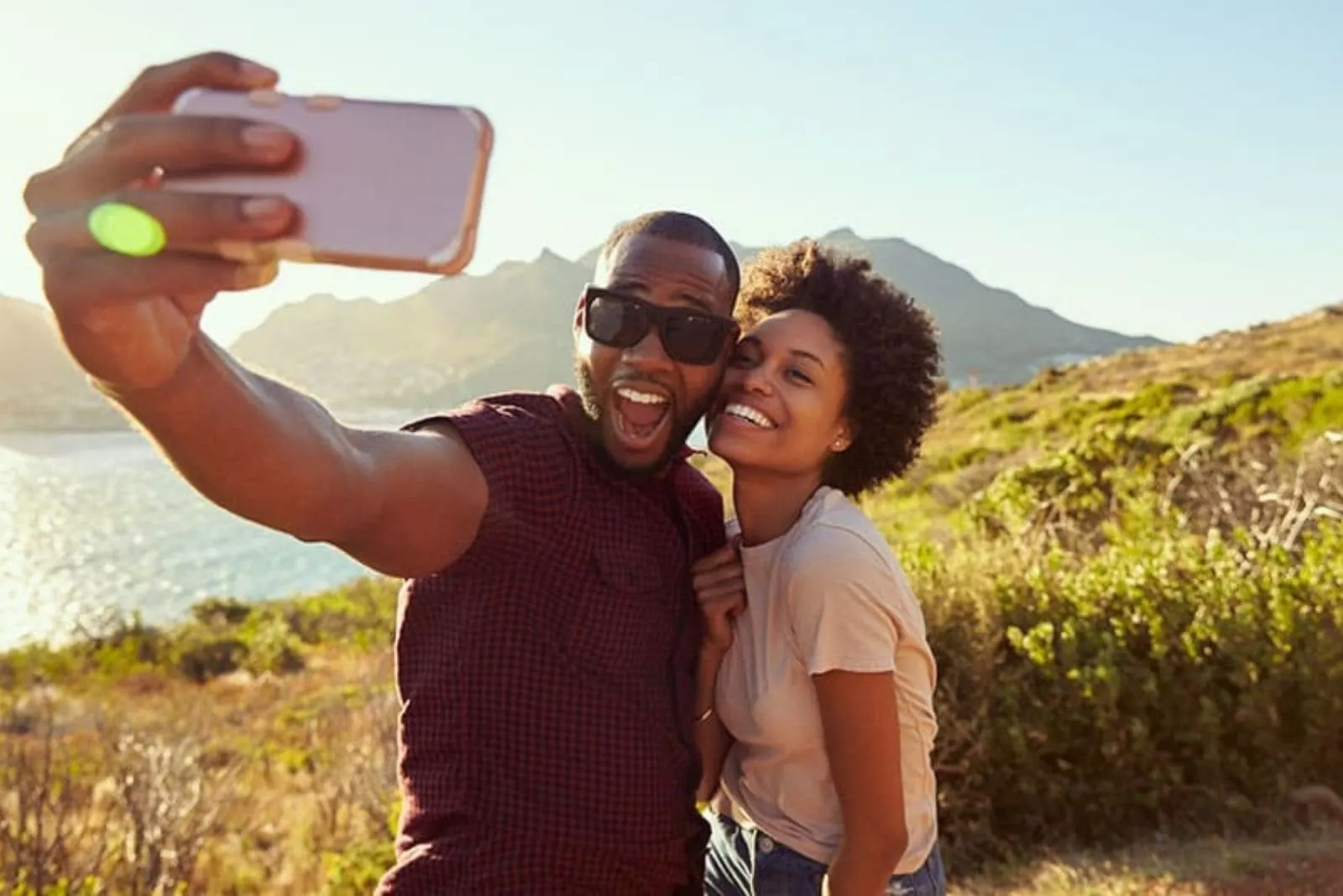 a man takes a picture with a woman