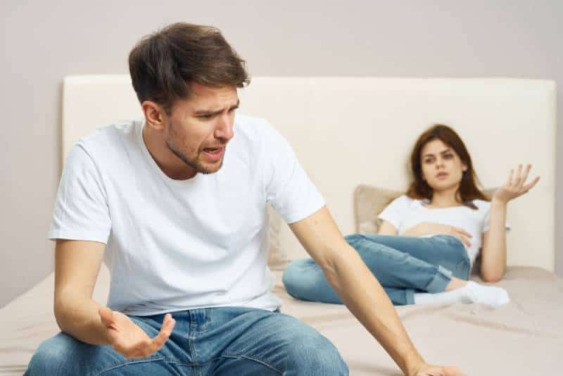 couple arguing in bedroom