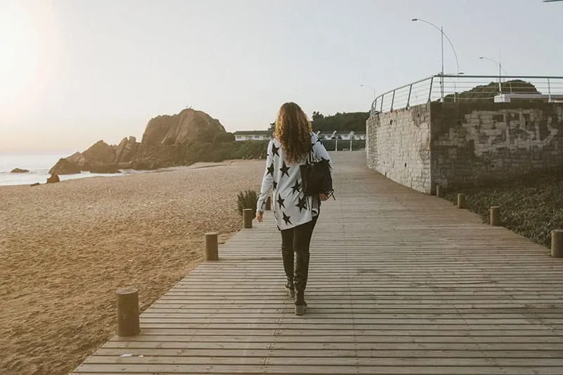 woman walking away