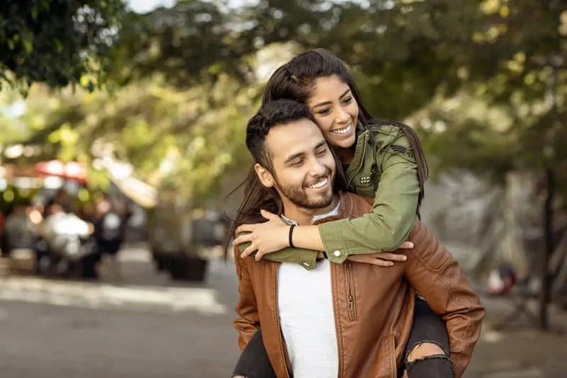 Couple in love. Enjoying happy in public park