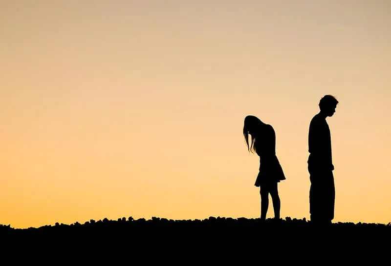 Silhouette of a angry woman and man on each other.Relationship difficulties 