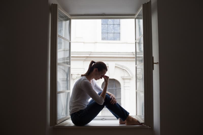 woman feeling sad and lonely