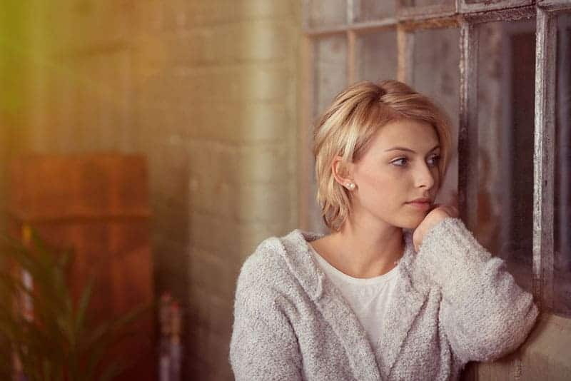 thoughtful young blonde woman