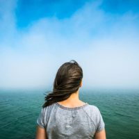 woman by the ocean