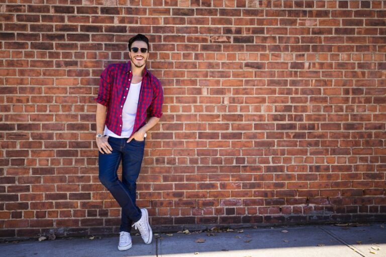 young handsome guy with sunglasees and red shirt