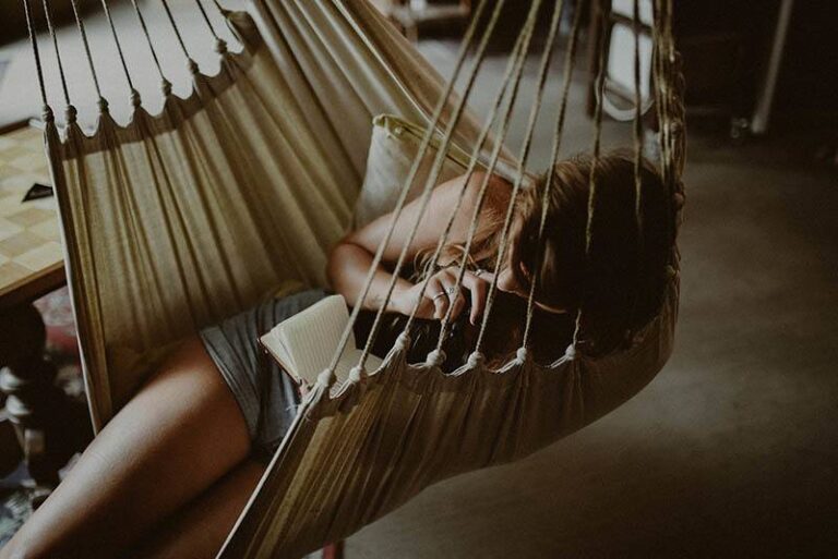 sad woman on deck chair