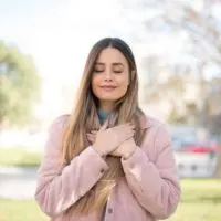 kind woman standing outdoor
