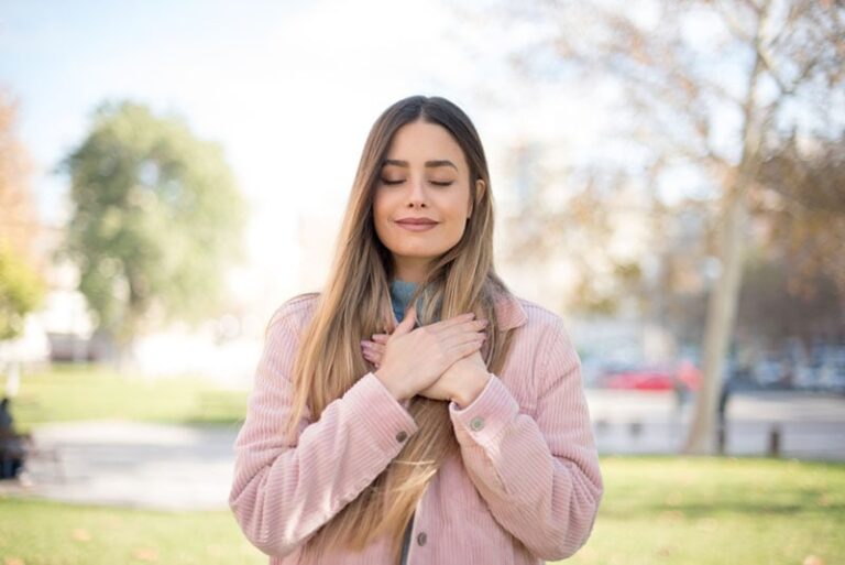 kind woman standing outdoor