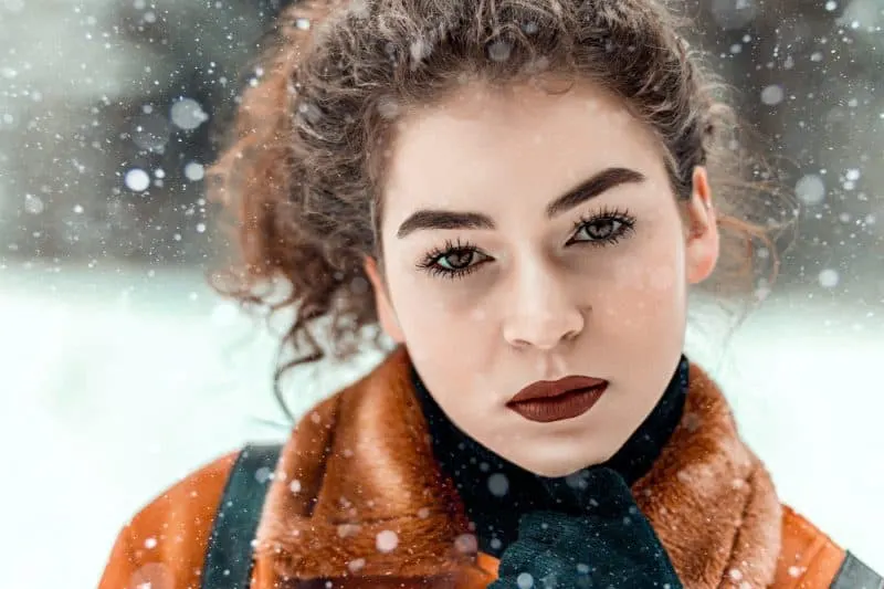beautiful woman on snow