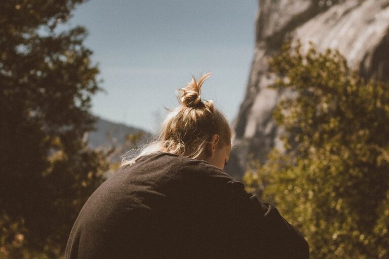woman sitting in nature