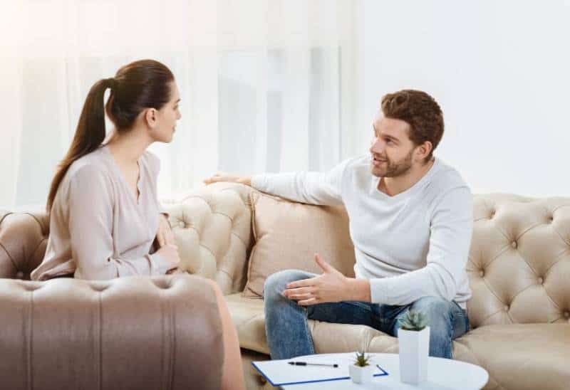 couple talking in living room