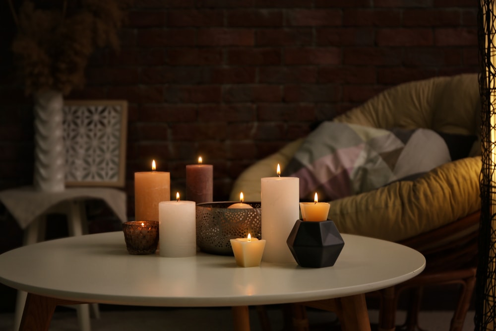 lighted candles on a white table