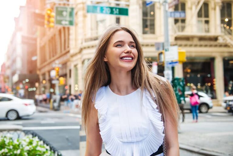 happy woman in the street