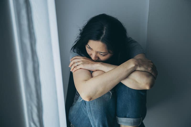 panic attacks alone young girl sad fear stressful depressed emotional.crying use hand cover face begging help.stop abusing domestic violence in women,person with health anxiety,people bad feeling down