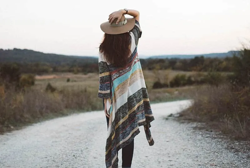 woman walking alone in nature