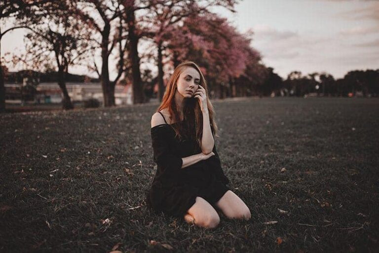woman sitting on the grass