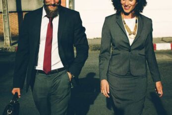 20 Unmistakable Signs A Coworker Likes You & Wants Something More
