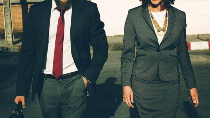 20 Unmistakable Signs A Coworker Likes You & Wants Something More