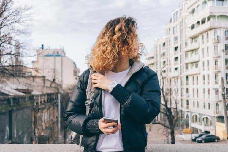 woman holding a phone