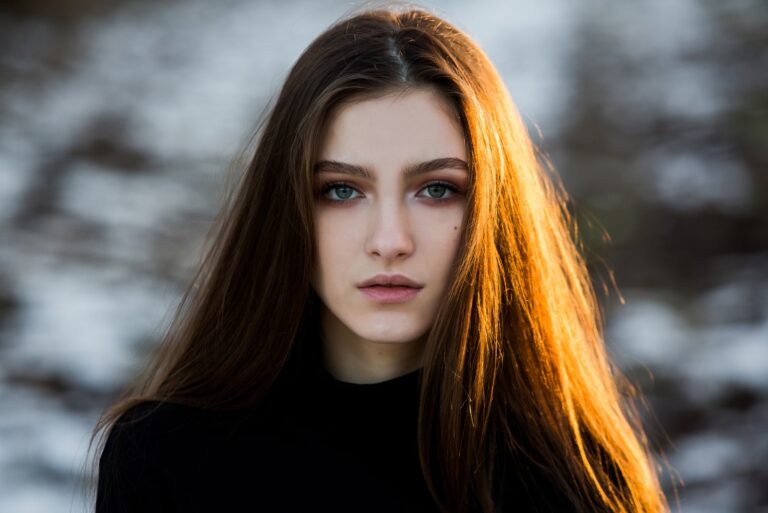 beautiful girl with flying hair in the wind