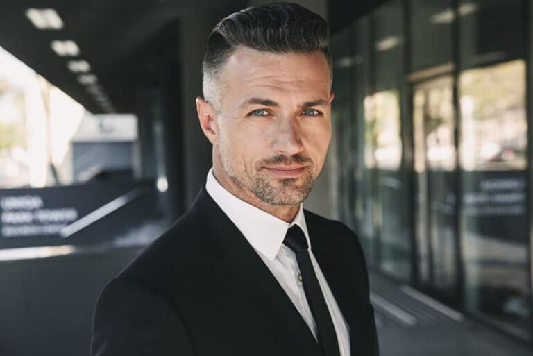 mature man in suite posing