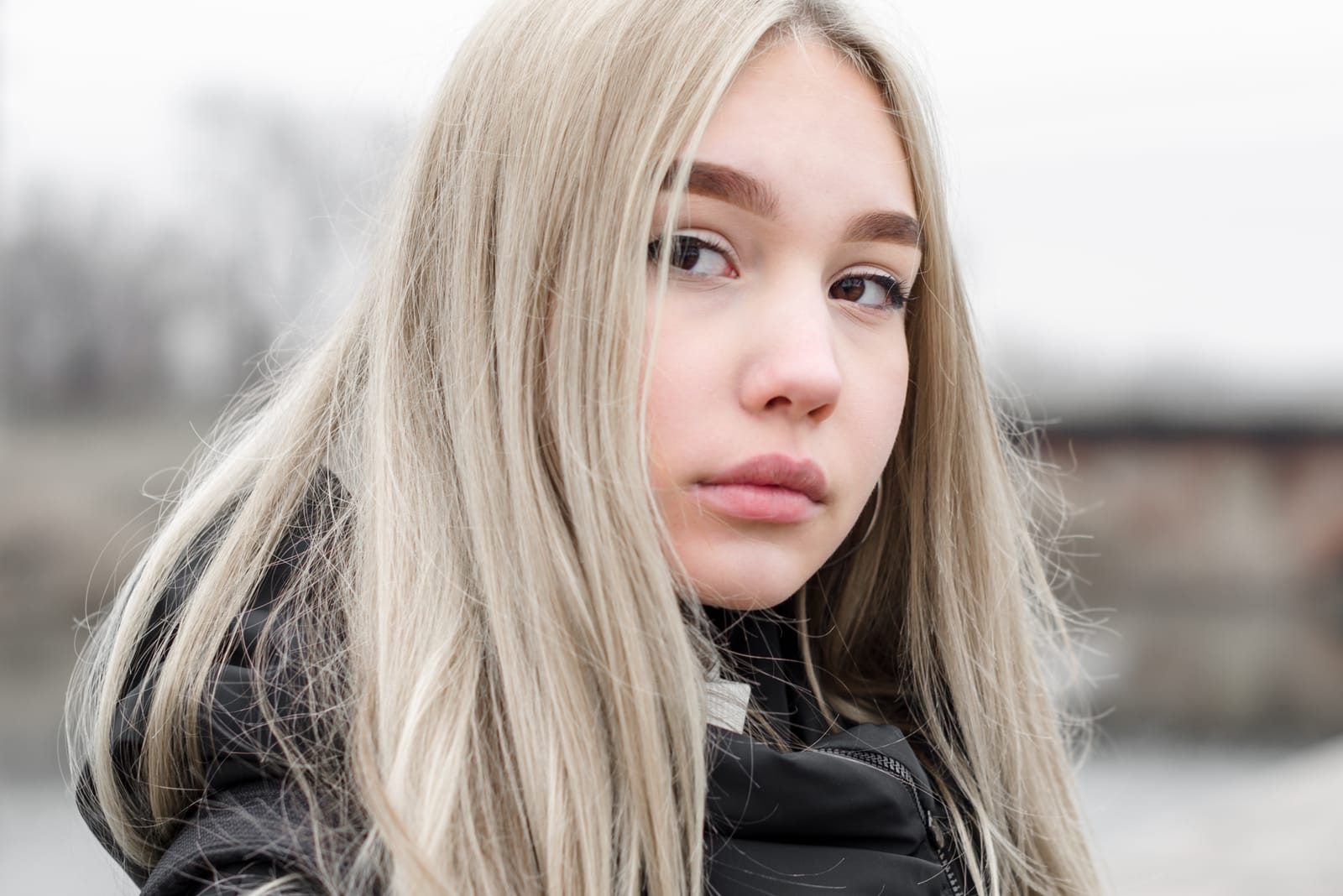portrait of a young sad blonde