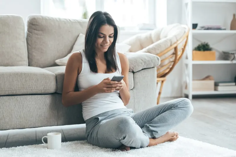 woman sitting on the floor