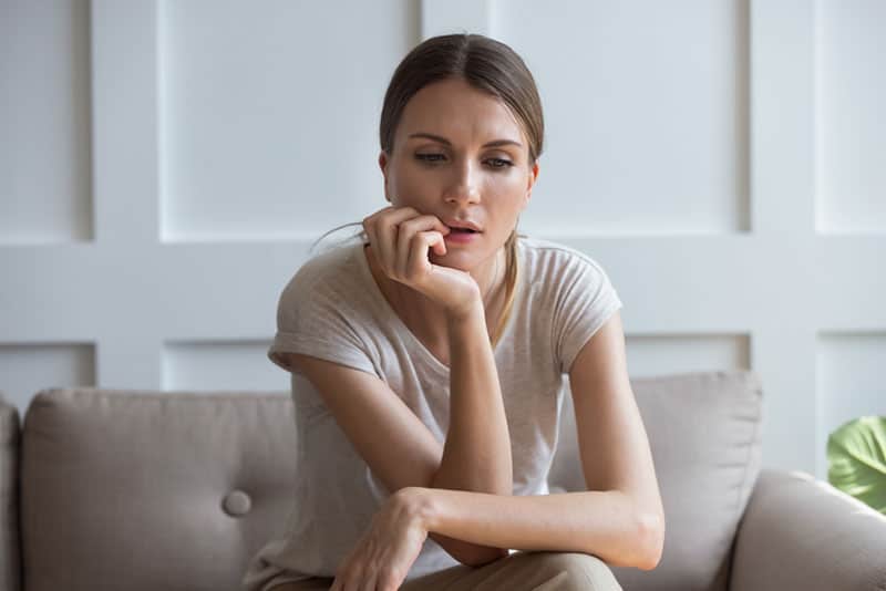 worried woman in deep thoughts