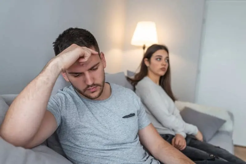 Couple on couch at home