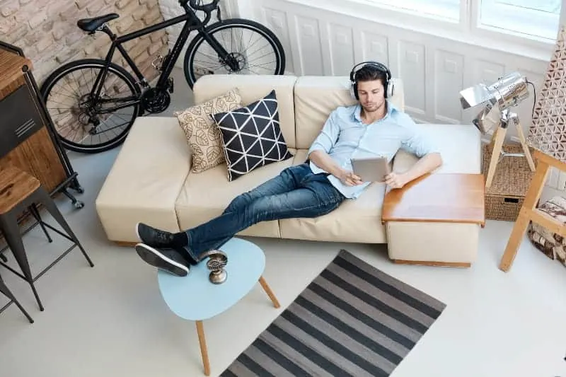 Man listening music at home