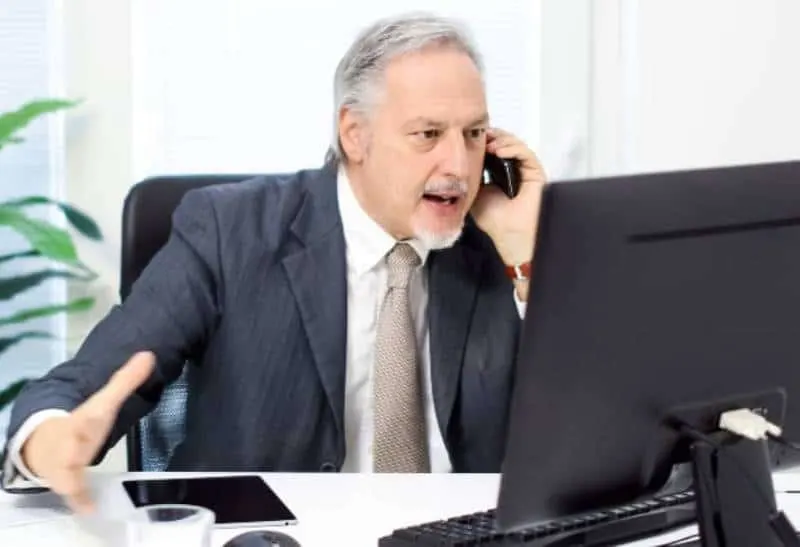 impatient boss yelling at phone