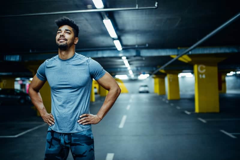 man standing on parking