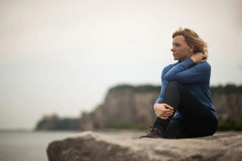 pensive woman on the beach