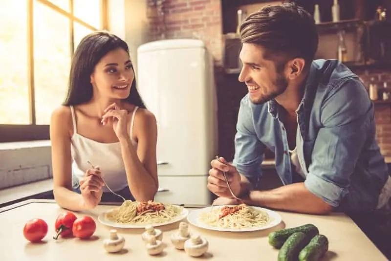 smiling couple in kitchen