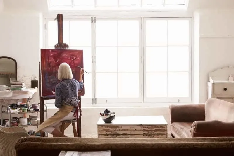 woman painting at home