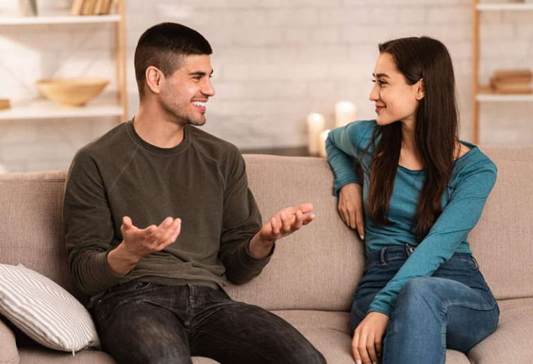 happy man talking with woman