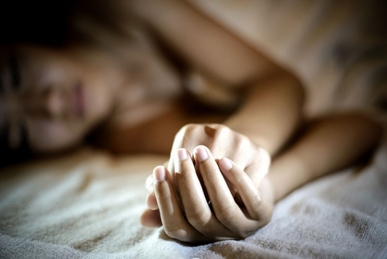 depressed woman lying