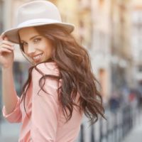 attractive woman with hat posing