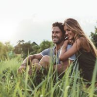 couple enjoy together in grass