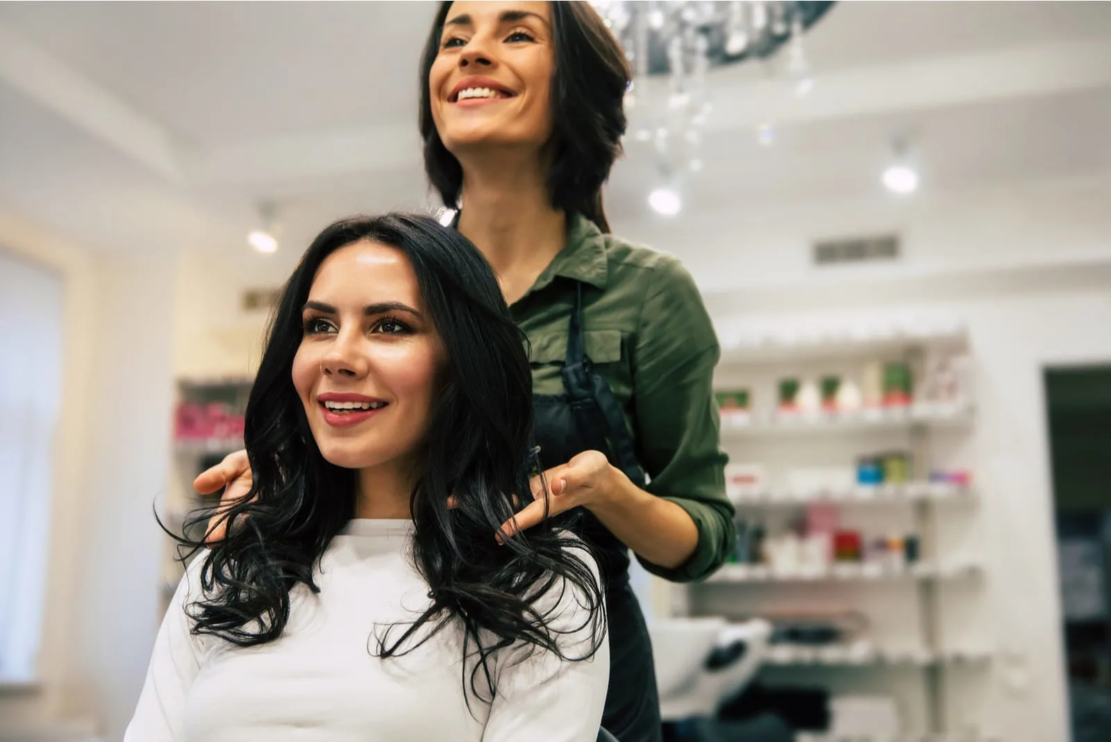smiling brunette at hairdresser's haircut
