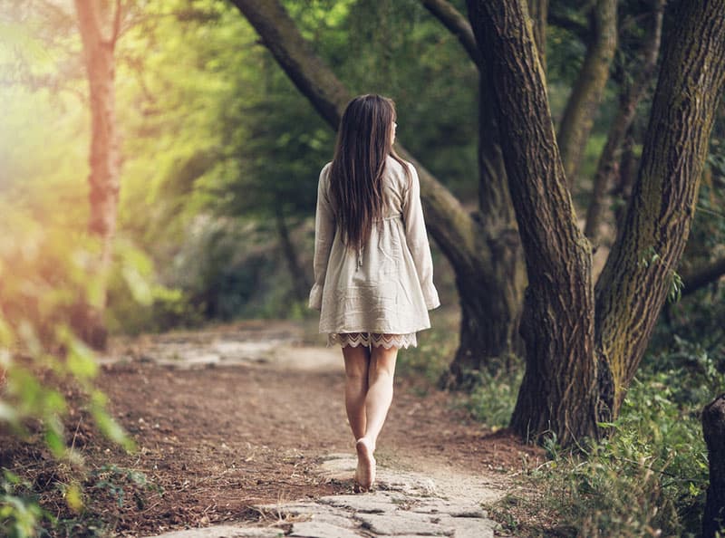 woman walking away