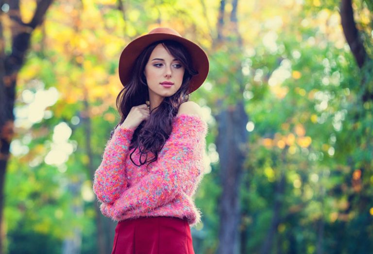 thoughtful woman with red hat