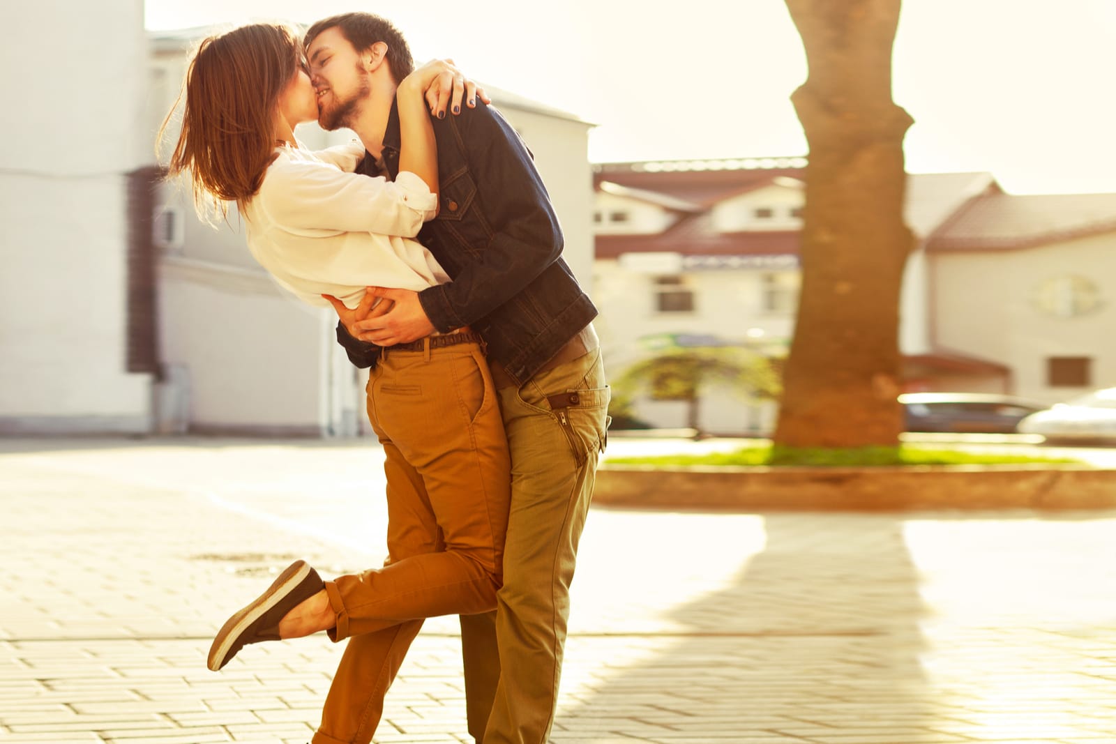 lovely couple kissing outside