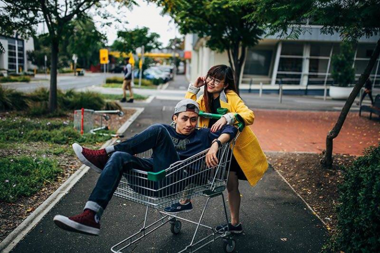 man in shopping cart