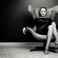 confidence woman sitting on chair