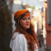 beautiful woman wearing hair scarf outdoor