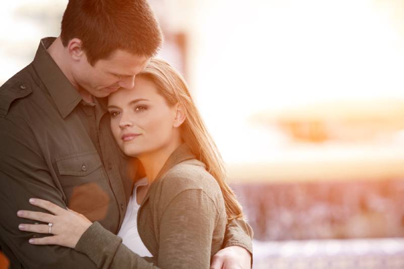 couple in love hugging outside