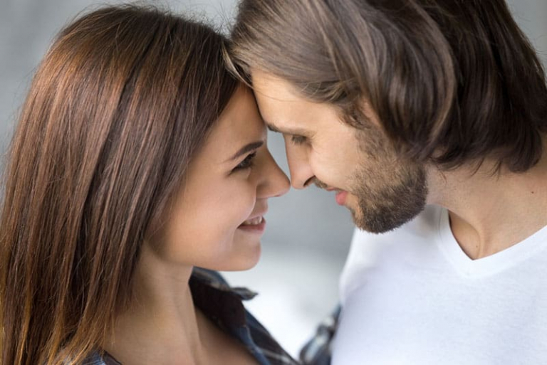 couple in love cuddling with noses