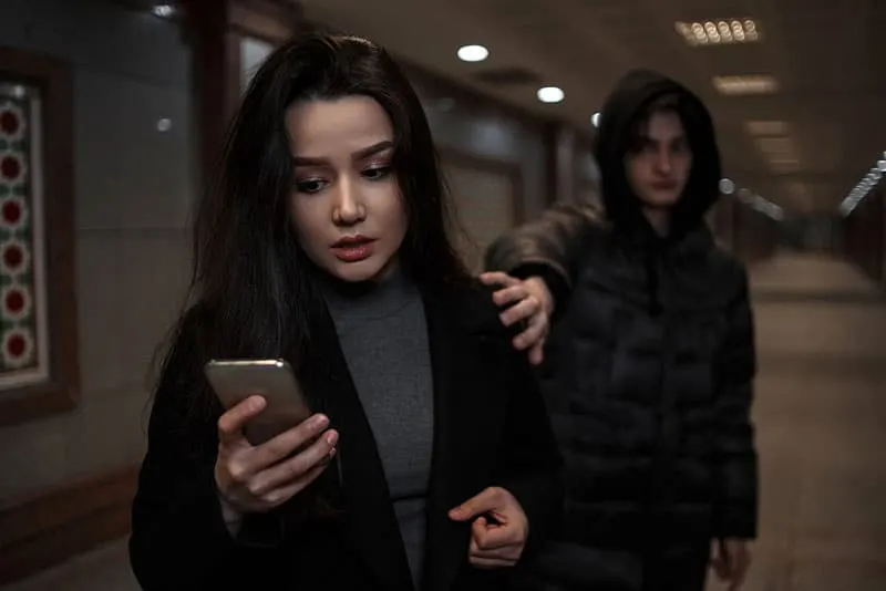 girl checking her boyfriends mobile