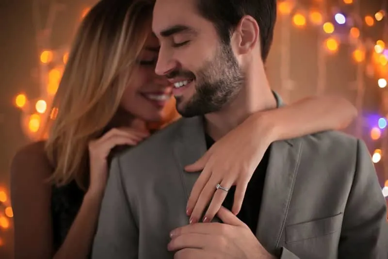 happy young couple in party
